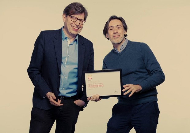 Association of French Film Critics president Philippe Rouyer and director Emmanuel Mouret with his prize for Love Affair(s)